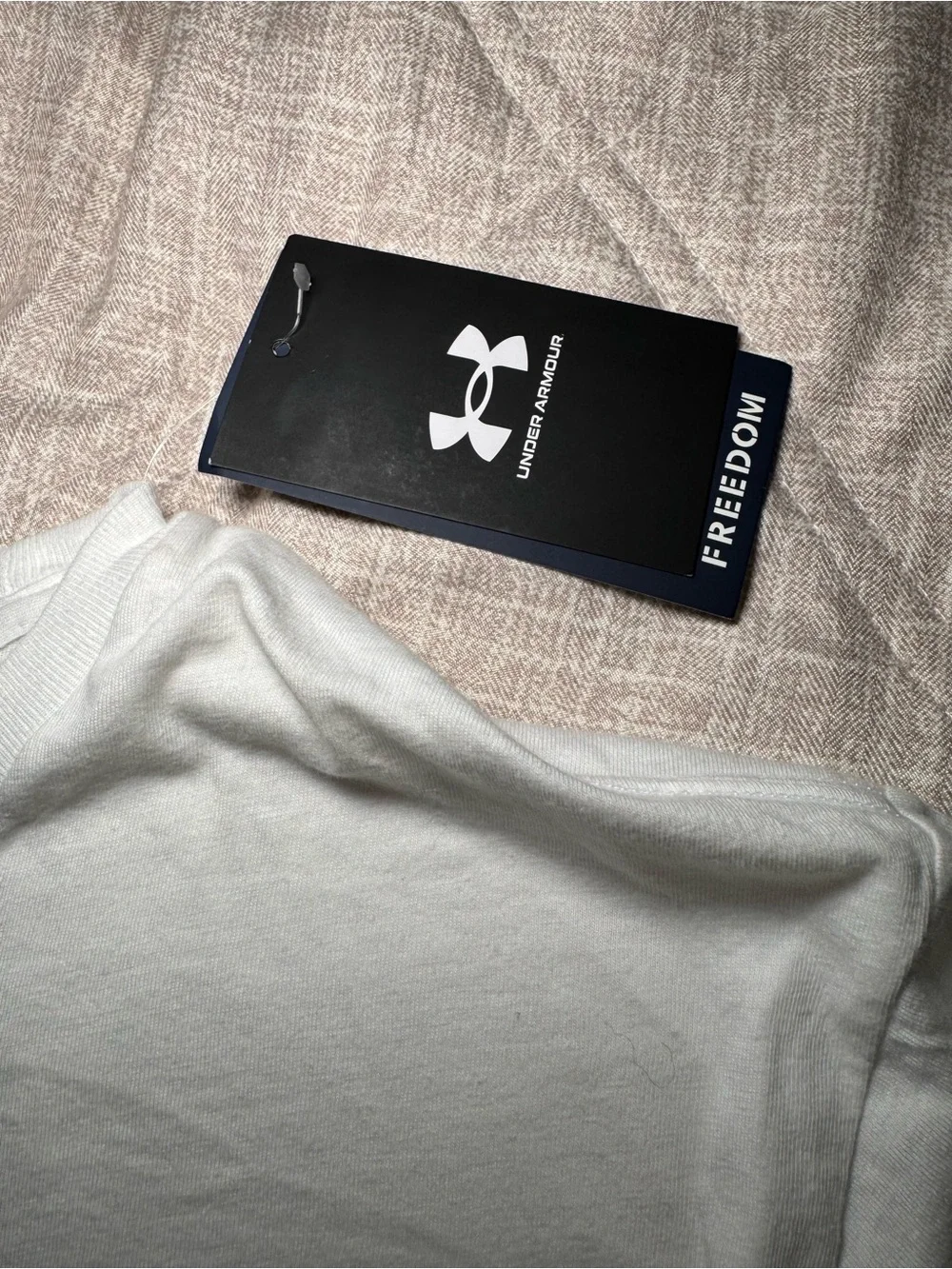Under Armour White Short Sleeve Freedom Performance Tee with Blue Logo